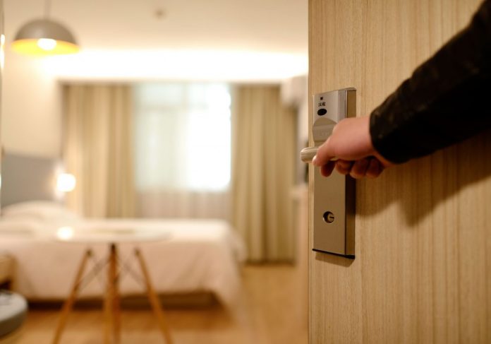 Opening hotel room door