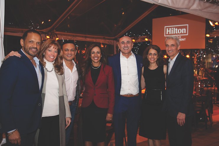 Anu Saxena (center) at the ALIS conference in January 2018 with other members of the Hilton leadership team. 