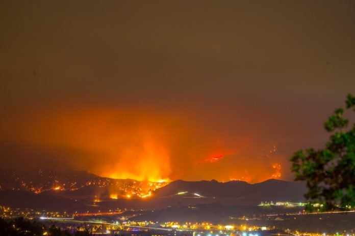 Night long exposure photograph of the Santa Clarita wildfire in CA. The Santa Clarita Valley mountains has drawn firefighters and emergency crews in the hills toward Acton. So far, the fire has burned 38,346 acres.