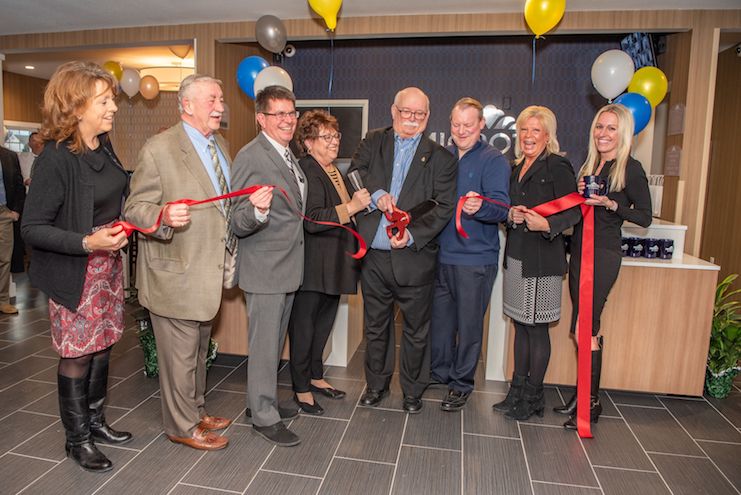 Hotel owners and community members celebrate the grand opening of Microtel Inn & Suites by Wyndham Carlisle on Westminster Drive, Wednesday, January 16, 2019. The newly-built, 80-room hotel offers guests an elevated hotel experience and economy price point with average daily room rates ranging from $79.00 to $119.00. Pictured from left to right are Michelle Crowley, president & CEO of the Carlisle Area Chamber of Commerce; Robert Yentzer, hotel owner; Robert Frey, primary hotel owner; Pam Fisher, sales associate at Berkshire Hathaway HomeServices; William Morris Kronenberg, hotel owner; Keri Putera, vice president, Brand Operations for Microtel by Wyndham; and Valerie Copenhagen, senior director, Marketing & Tourism, Cumberland Area Economic Development Corporation (CAEDC).