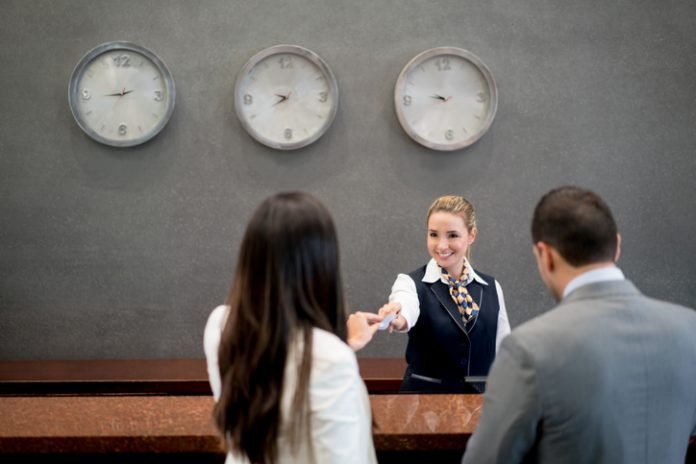 Hotel staff front desk — employee retention