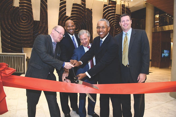 Jenkins helps cut the ribbon at the opening of the Courtyard and Residence Inn by Marriott Washington Downtown/Convention Center.