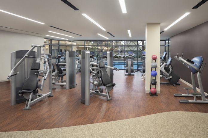 Fitness is front-and-center in the reimagined DoubleTree by Hilton Hotel Newark Airport. (Photo: Villano Photo, courtesy of LEO A DALY)