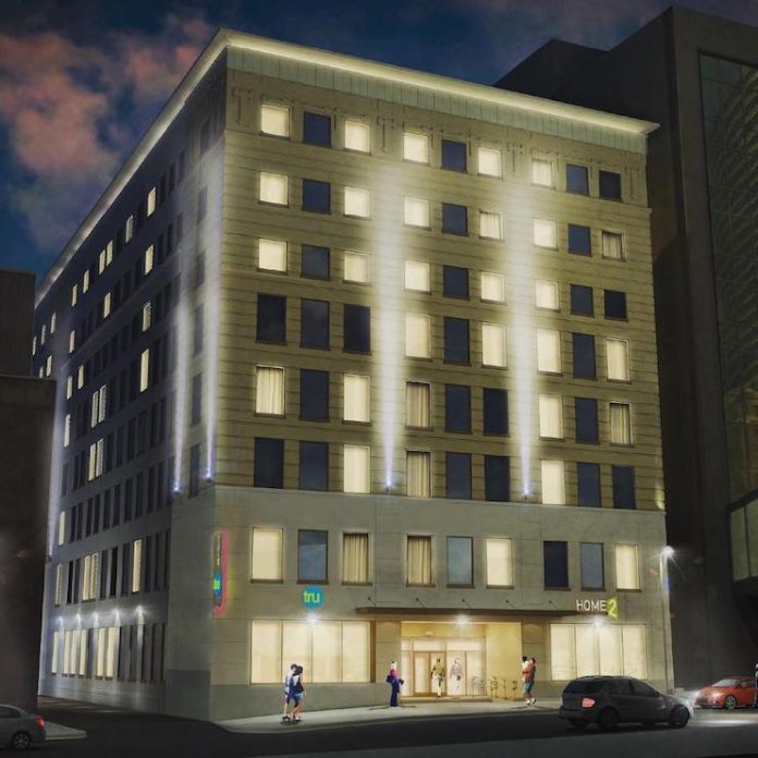 Iowa-based Hawkeye Hotels and Minnesota-based JR Hospitality began rehab on a dual-branded downtown hotel—the city's first Home2 Suites by Hilton and first Tru by Hilton.