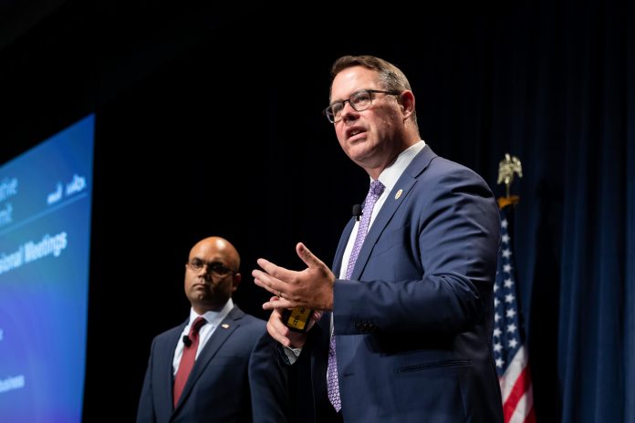 Chirag Shah and Brian Crawford on stage at 2019's Legislative Action Summit.