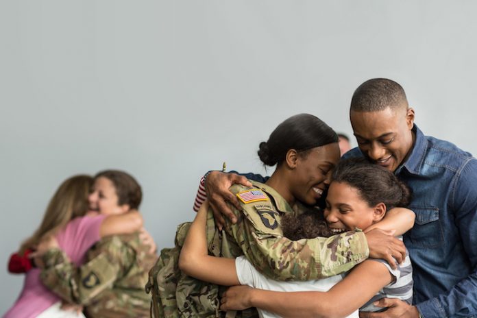 Country Inn & Suites partners with USO to reunite veterans and their families for Veterans Day