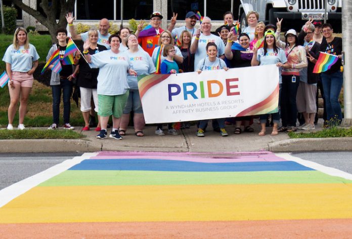 Wyndham Hotels & Resorts team members in Saint John, New Brunswick, Canada, support the local LGBTQ community through participating in a Pride march and painting a crosswalk outside of the Saint John office (August 2019).