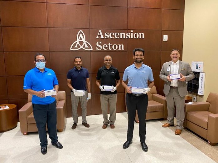 Neal Patel (second from right) of Blue Chip Hotels donates protective face masks at Ascension Seton Williamson Hospital in Round Rock, Texas as part of a 25,000 mask contribution by 12 hoteliers in four states.
