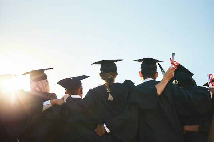 Graduates complete their education