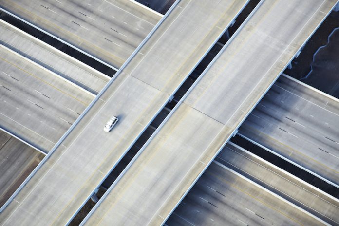 Empty highway with one car