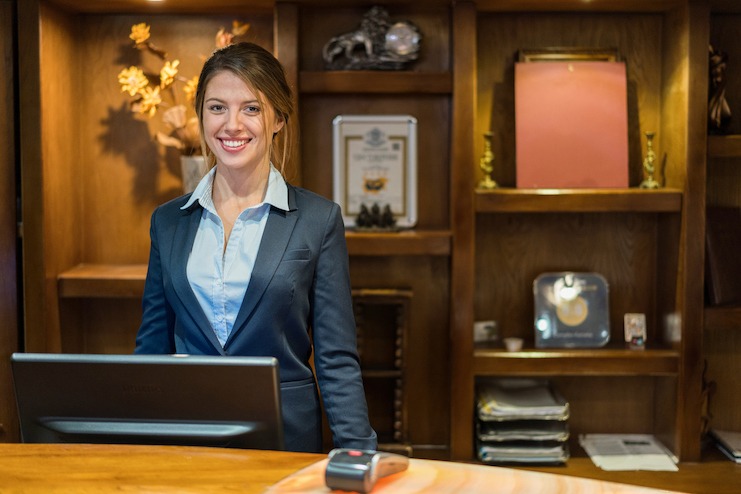 Hotel employee at the front desk