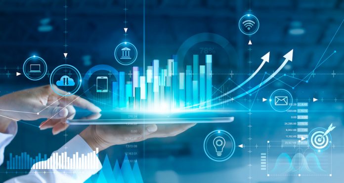 Machine learning forecasting concept - person holds tablet with data visualization graphics