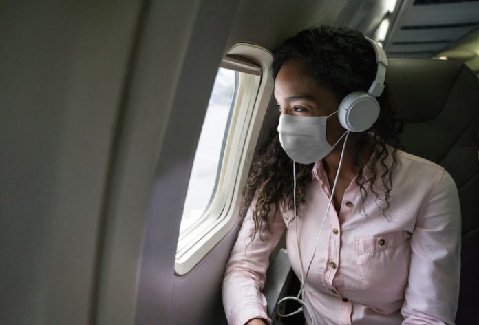 Traveling on an airplane wearing a face mask