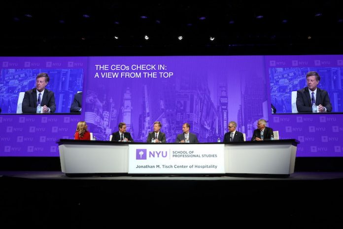 During the “CEO’s Check-In: A View from the Top” session at the 44th Annual NYU International Hospitality Industry Investment Conference, hosted by the NYU SPS Jonathan M. Tisch Center of Hospitality, CNBC’s Sara Eisen (far left) moderated a discussion with panelists Keith Barr, CEO, IHG Hotels & Resorts; Sébastien M. Bazin, chairman & CEO, Accor; Anthony Capuano, CEO, Marriott International; Mark S. Hoplamazian, president & CEO, Hyatt Hotels Corporation; and Christopher J. Nassetta, president & CEO, Hilton. Photo Credit: ©Hollenshead: Courtesy of NYU Photo Bureau
