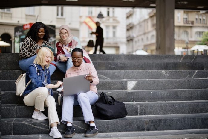 Students sitting on a staircase